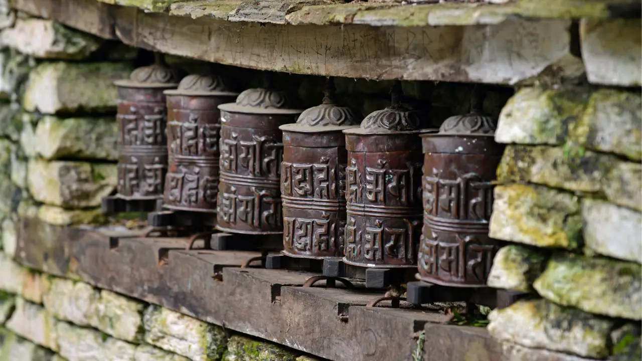 Prayer wheels along a Himalayan trail — community stewardship